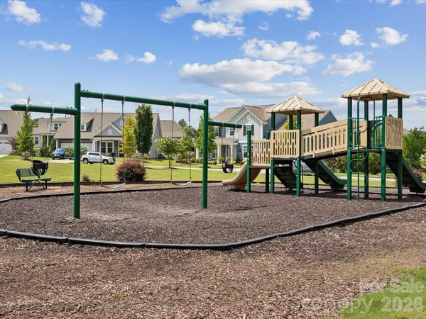 a view of a garden with a slide