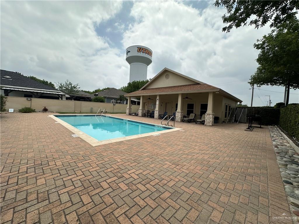 818 Hill Country Road Edinburg, TX 78539 - Photo 21 of 24 a view of a house with swimming pool and sitting area