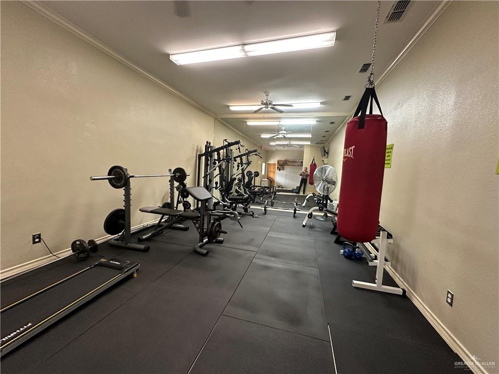 818 Hill Country Road Edinburg, TX 78539 - Photo 23 of 24 a view of a room with gym equipment
