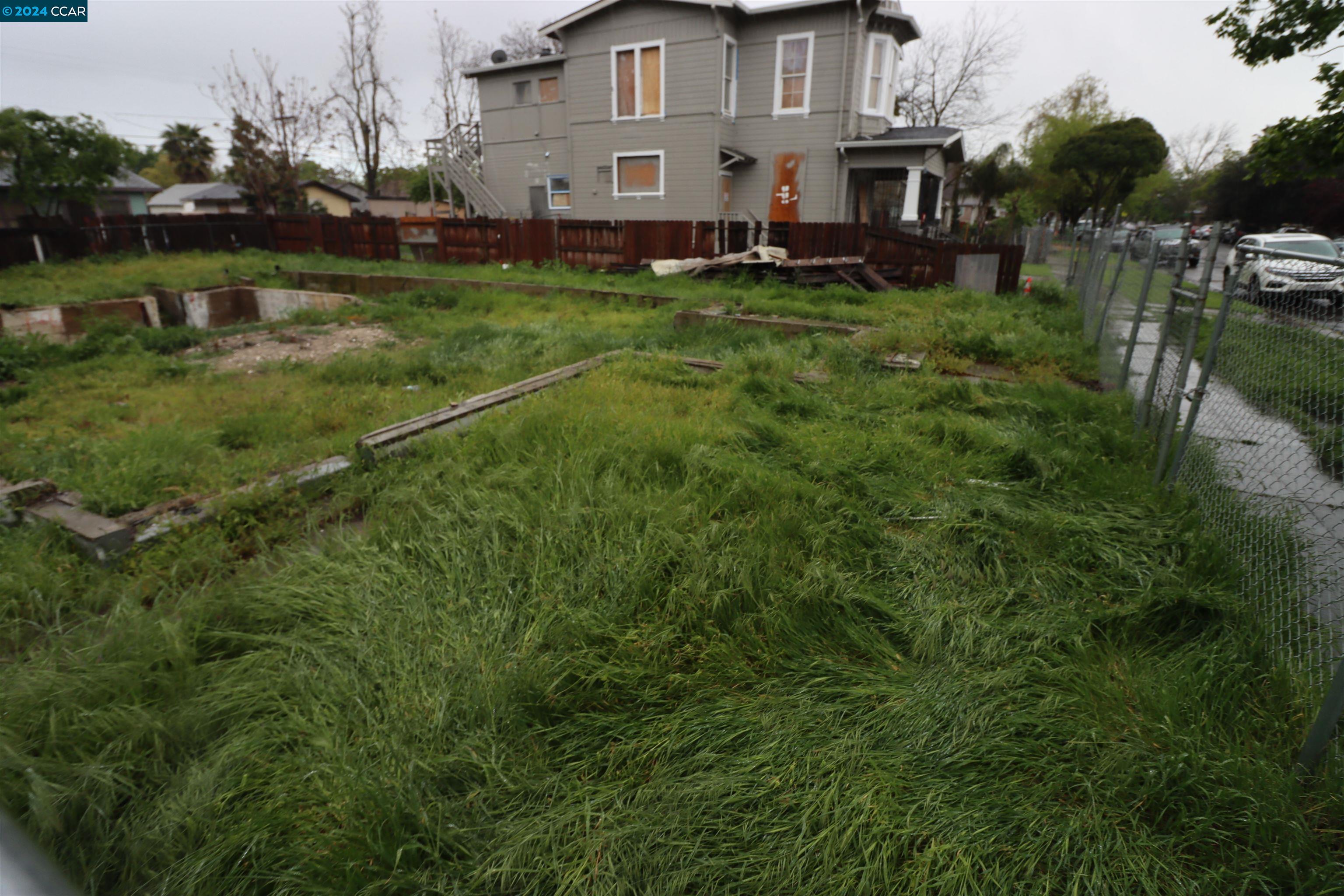 1602 South Sutter Street Stockton, CA 95206 - Photo 11 of 12 a view of a house with a big yard