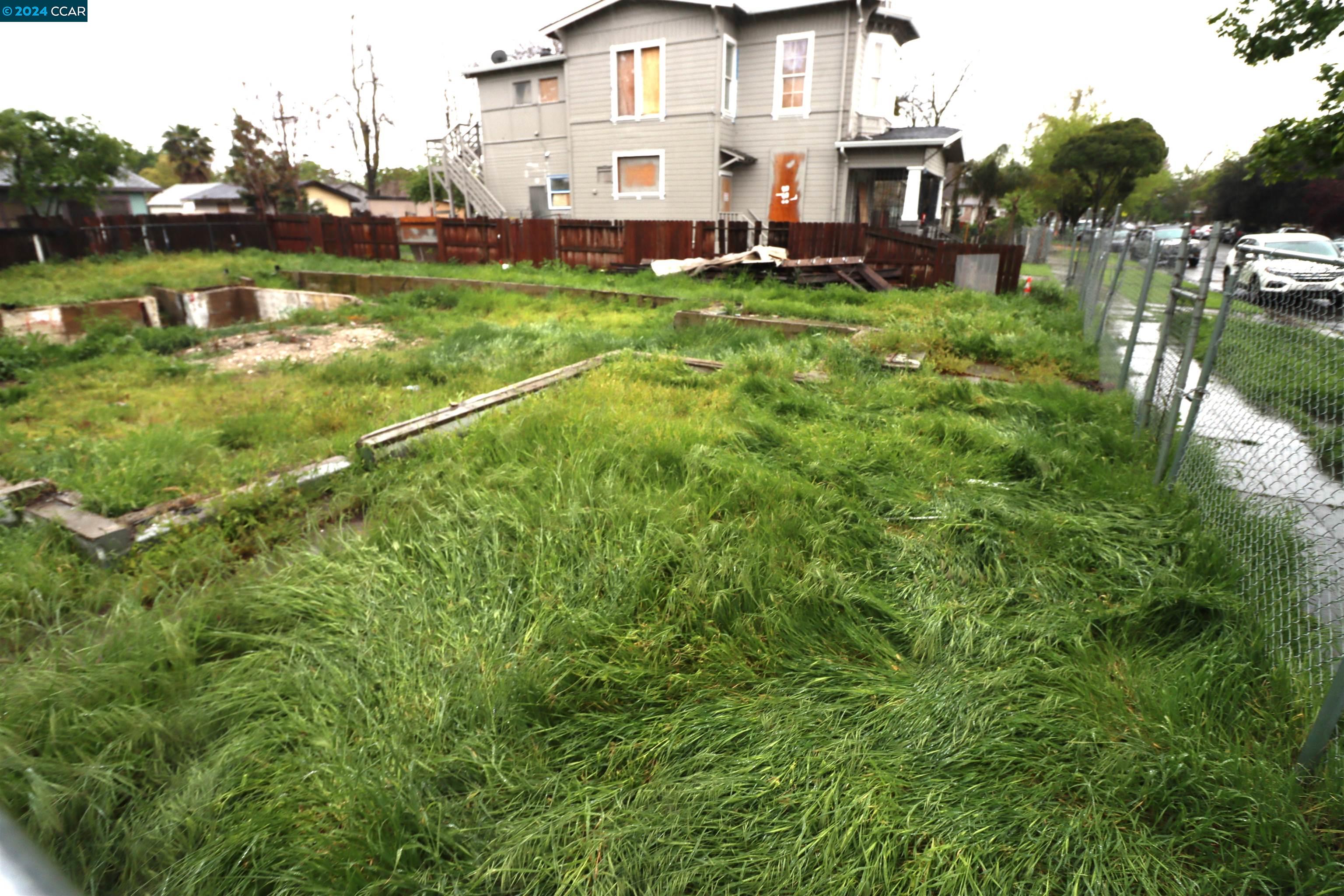 1602 South Sutter Street Stockton, CA 95206 - Photo 12 of 12 a view of a house with a big yard