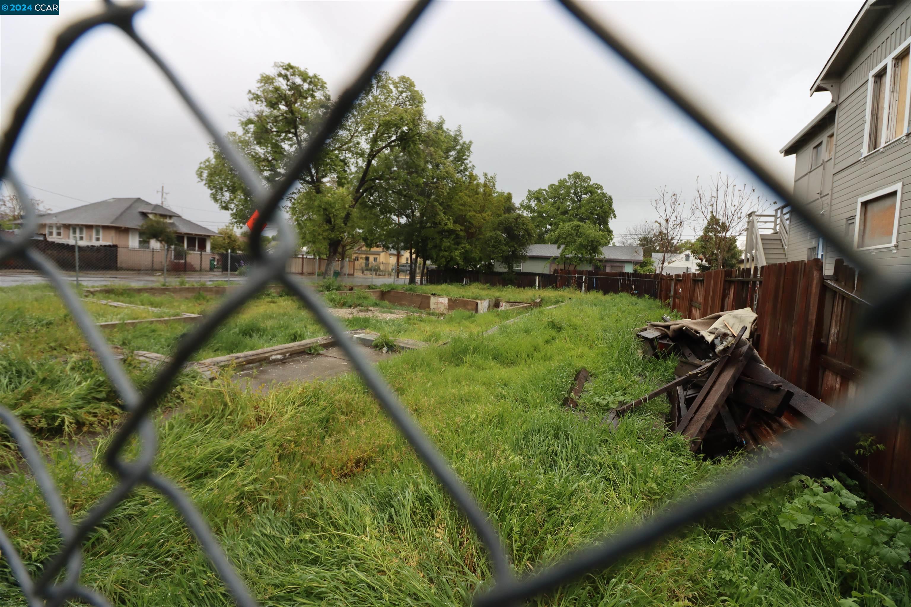 1602 South Sutter Street Stockton, CA 95206 - Photo 2 of 12 a view of an outdoor space and a yard