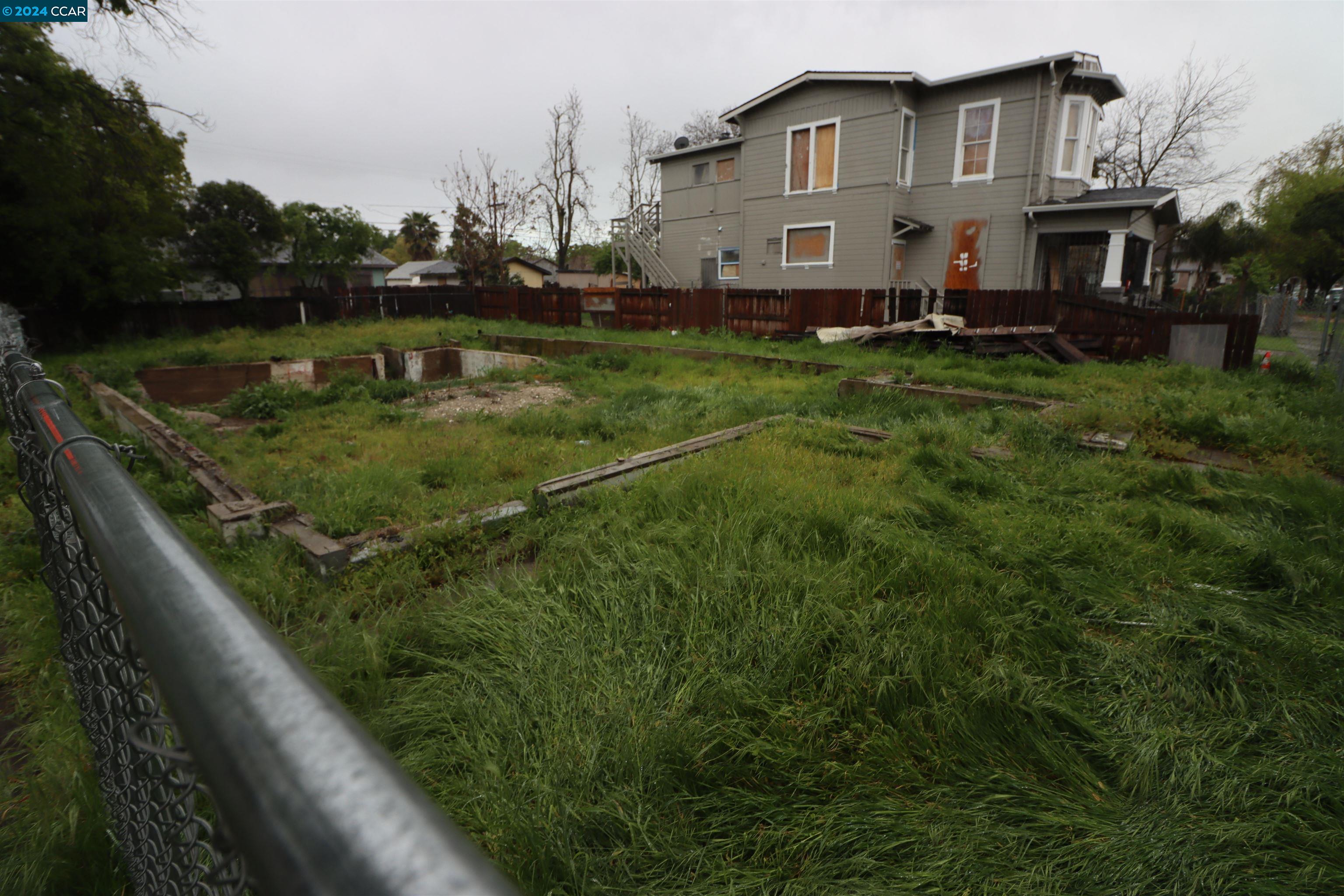 1602 South Sutter Street Stockton, CA 95206 - Photo 8 of 12 a view of a house with a yard