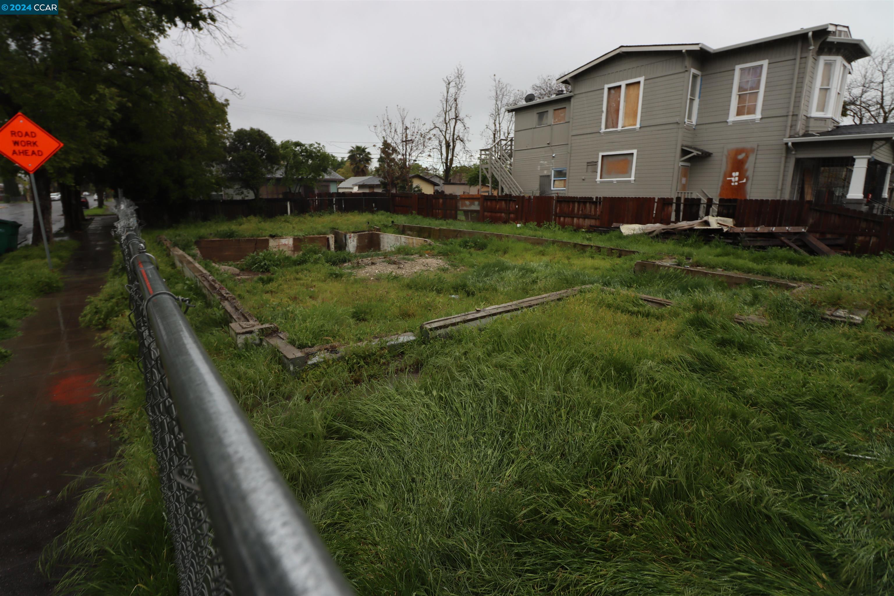 1602 South Sutter Street Stockton, CA 95206 - Photo 10 of 12 a view of a house with a yard