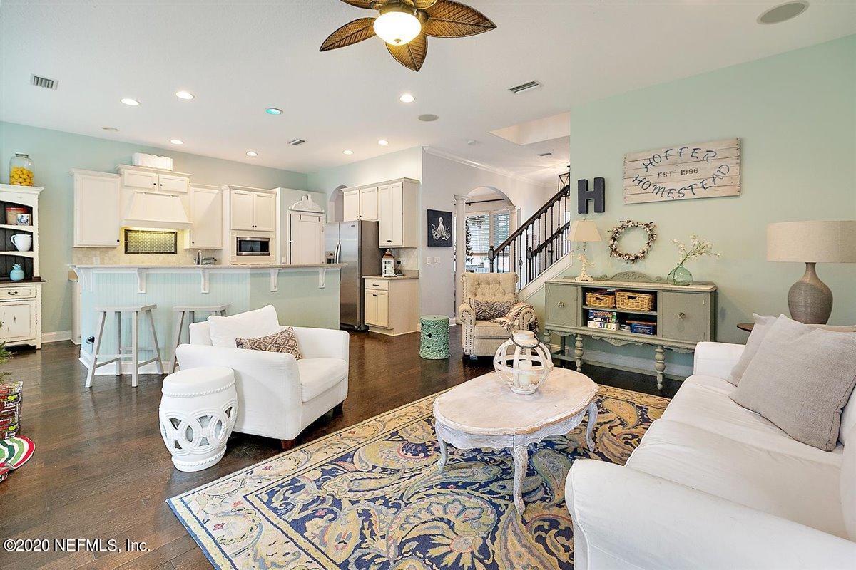 40 Pelican Pointe Road Ponte Vedra, FL 32081 - Photo 12 of 45 a living room with furniture and kitchen view