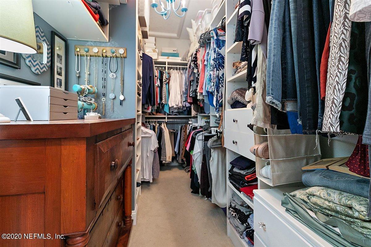 40 Pelican Pointe Road Ponte Vedra, FL 32081 - Photo 24 of 45 a view of walk in closet with clothes
