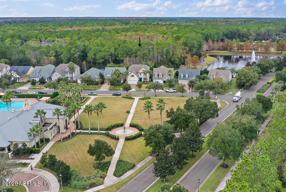 40 Pelican Pointe Road Ponte Vedra, FL 32081 - Photo 4 of 45 an aerial view of a house with outdoor space and a lake view