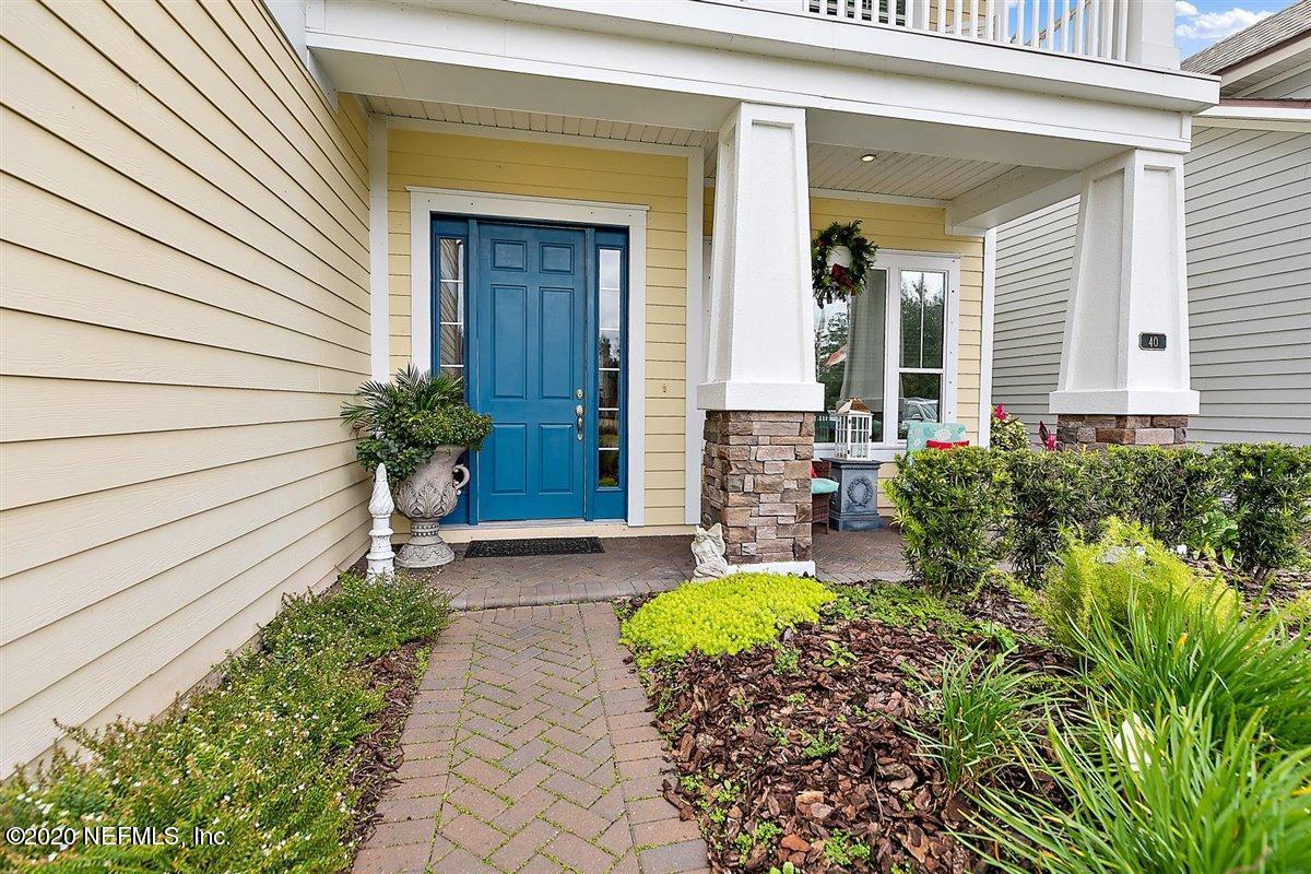 40 Pelican Pointe Road Ponte Vedra, FL 32081 - Photo 5 of 45 a house with a flower garden