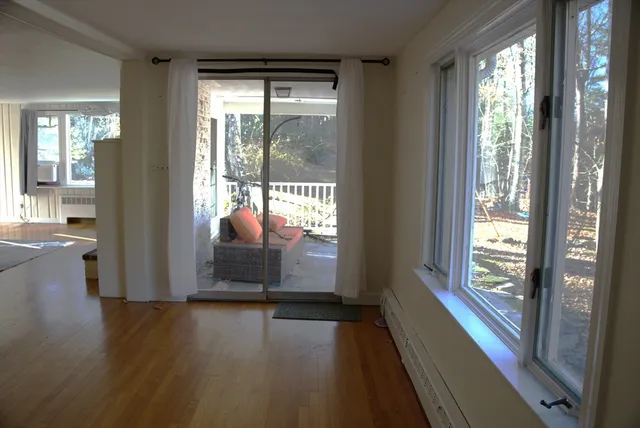 a view of entryway with wooden floor