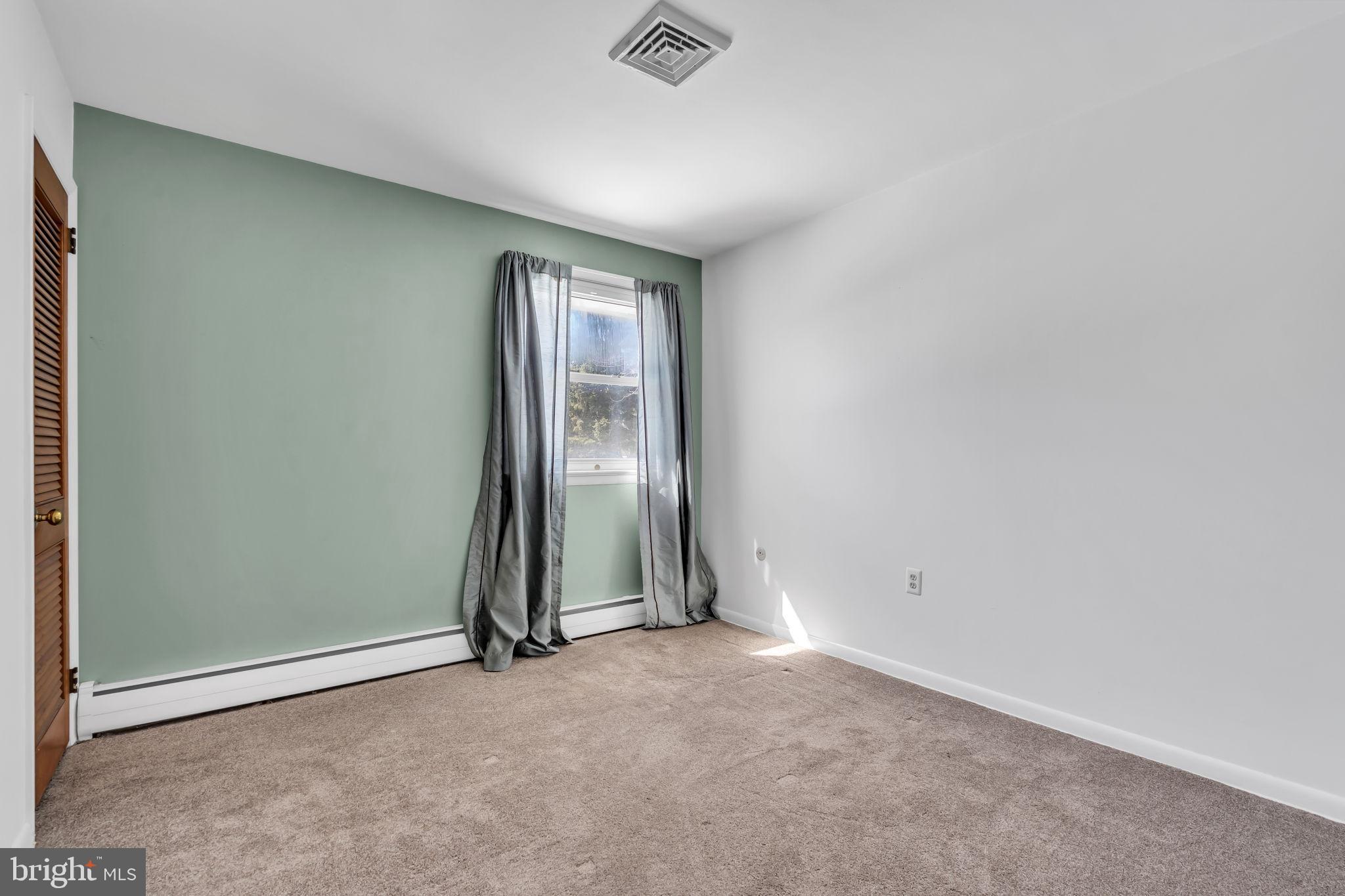 46 Sunset Avenue Hamilton, NJ 08610 - Photo 12 of 28 an empty room with an entryway