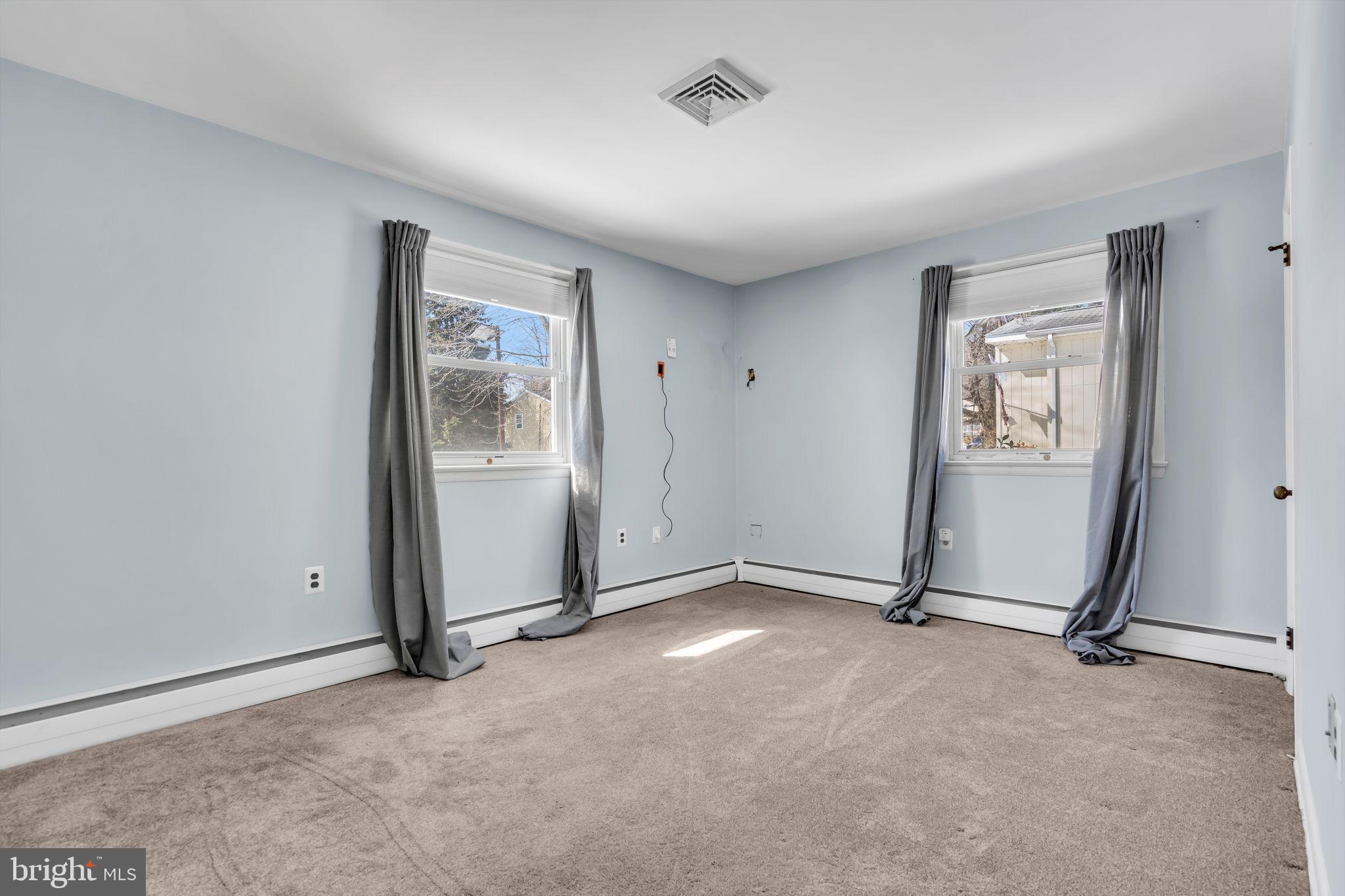 46 Sunset Avenue Hamilton, NJ 08610 - Photo 17 of 28 an empty room with windows