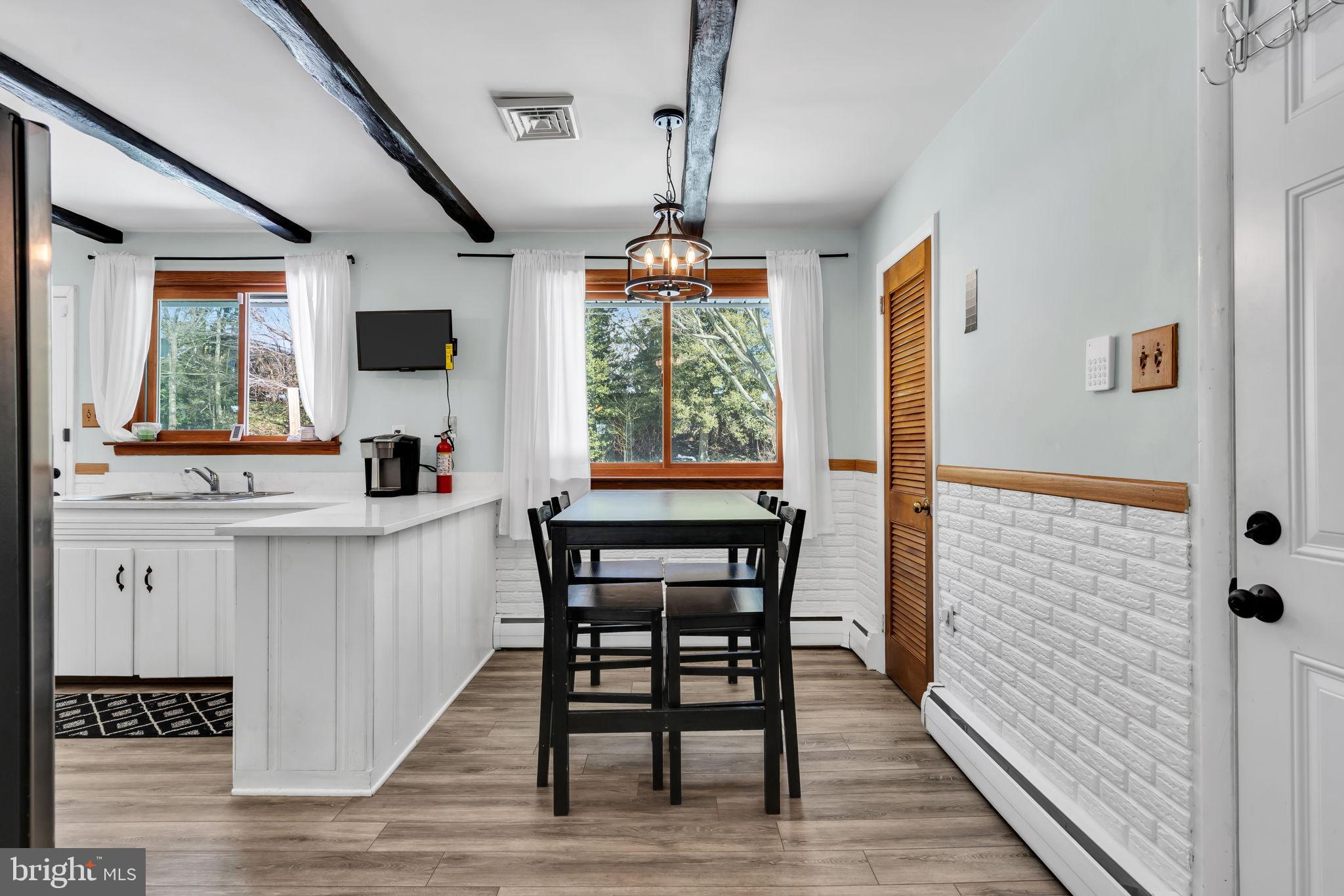 46 Sunset Avenue Hamilton, NJ 08610 - Photo 7 of 28 a dining room with furniture and window