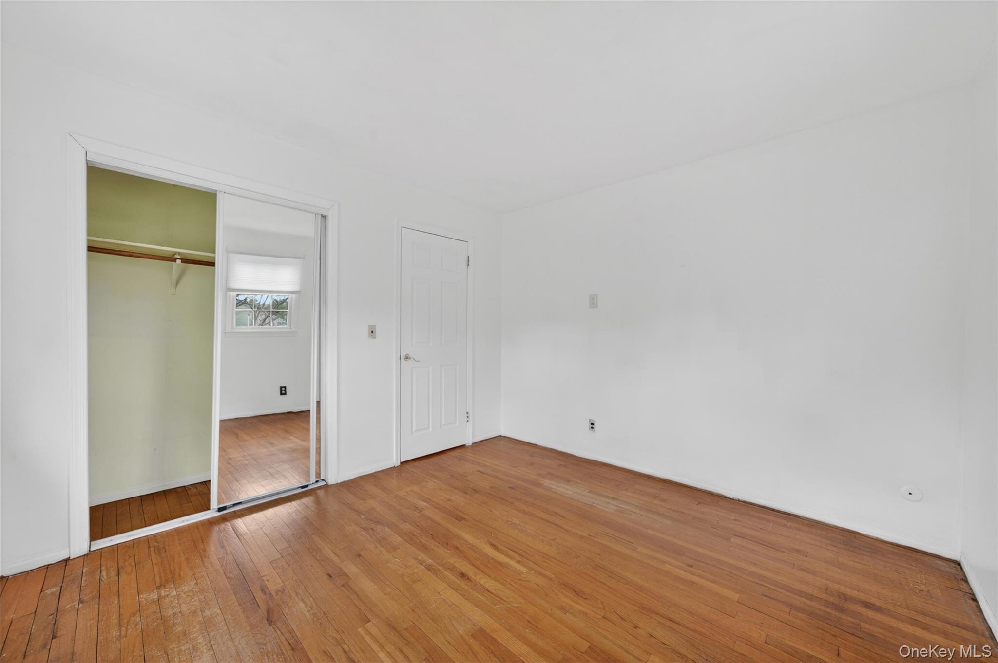 155 Pine Tree Road Monroe, NY 10950 - Photo 30 of 49 a view of empty room with wooden floor