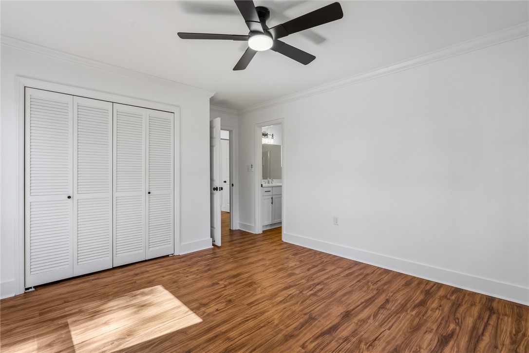 208 Williamsburg Road Anderson, SC 29621 - Photo 31 of 48 Rich wood flooring anchors this well-appointed space featuring classic crown molding.