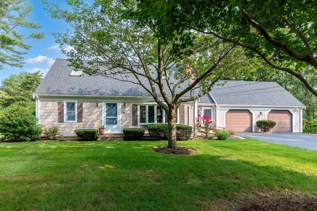 140 Rolling Hitch Road Barnstable, MA 02632 - Photo 1 of 36 a front view of house with yard and green space