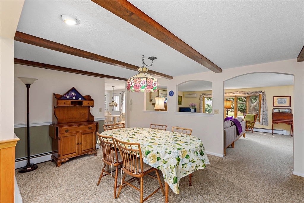 140 Rolling Hitch Road Barnstable, MA 02632 - Photo 12 of 36 a dining room with furniture and window