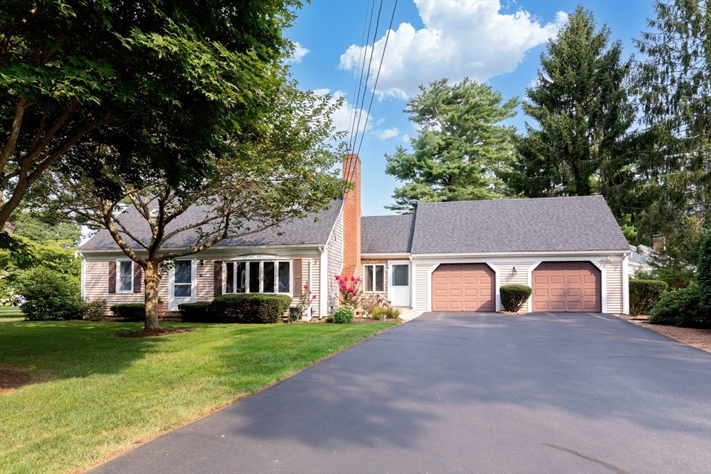 140 Rolling Hitch Road Barnstable, MA 02632 - Photo 2 of 36 a view of house with outdoor space and garden
