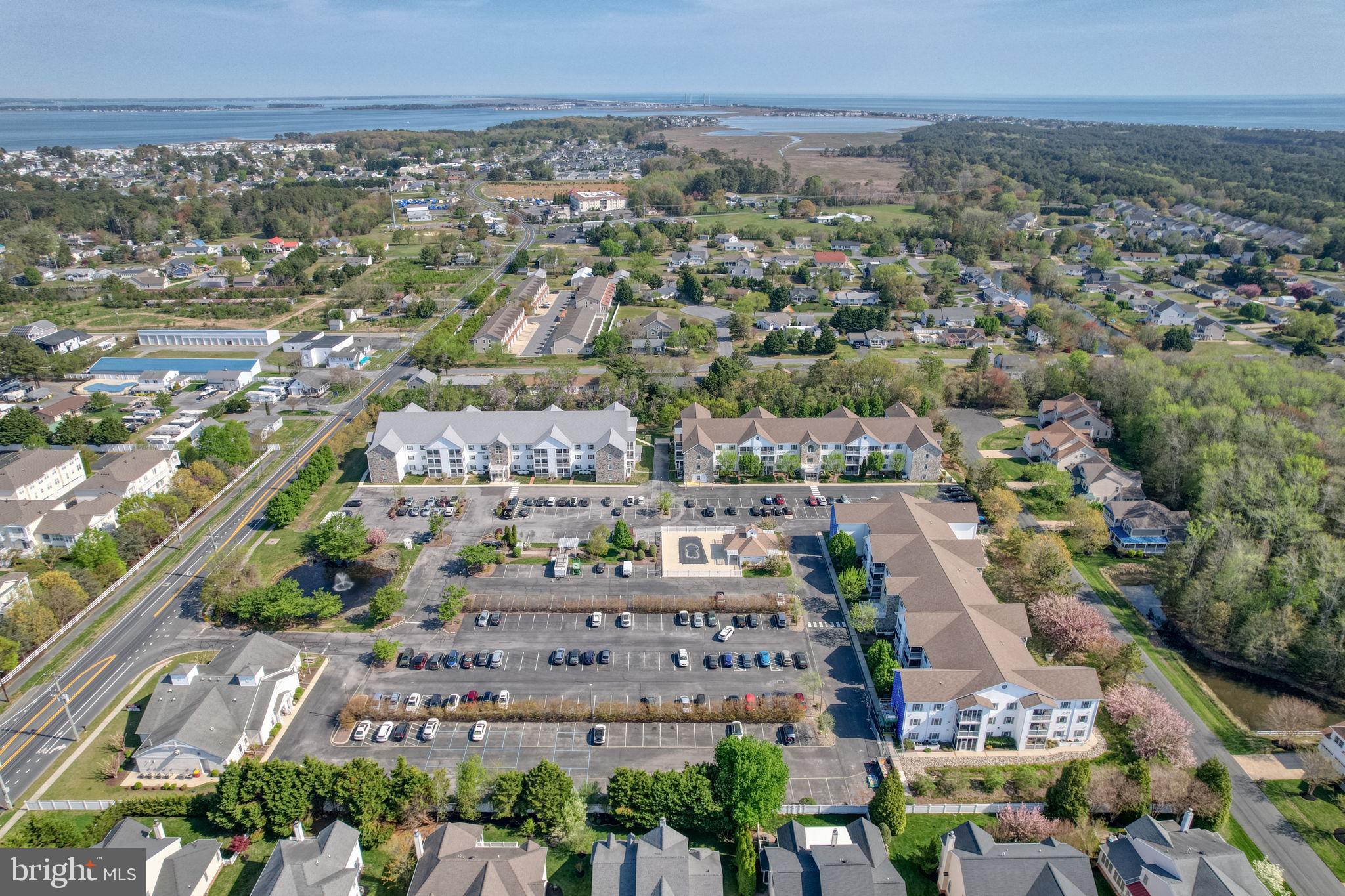 30619 Cedar Neck Road, Unit 1211 Ocean View, DE 19970 - Photo 3 of 64 Aerial view with ocean beyond