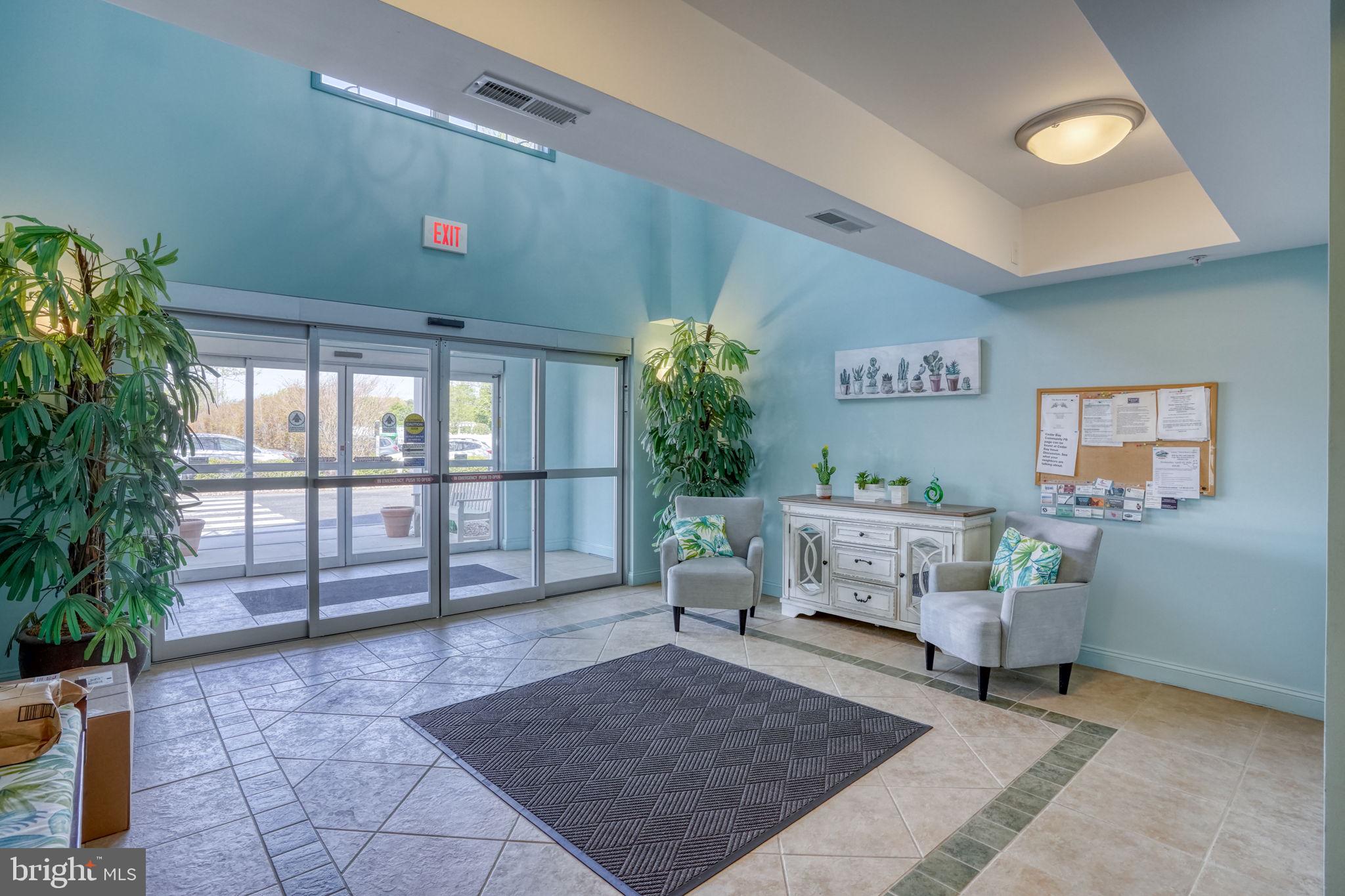 30619 Cedar Neck Road, Unit 1211 Ocean View, DE 19970 - Photo 36 of 64 Secure Main Entrance & Lobby