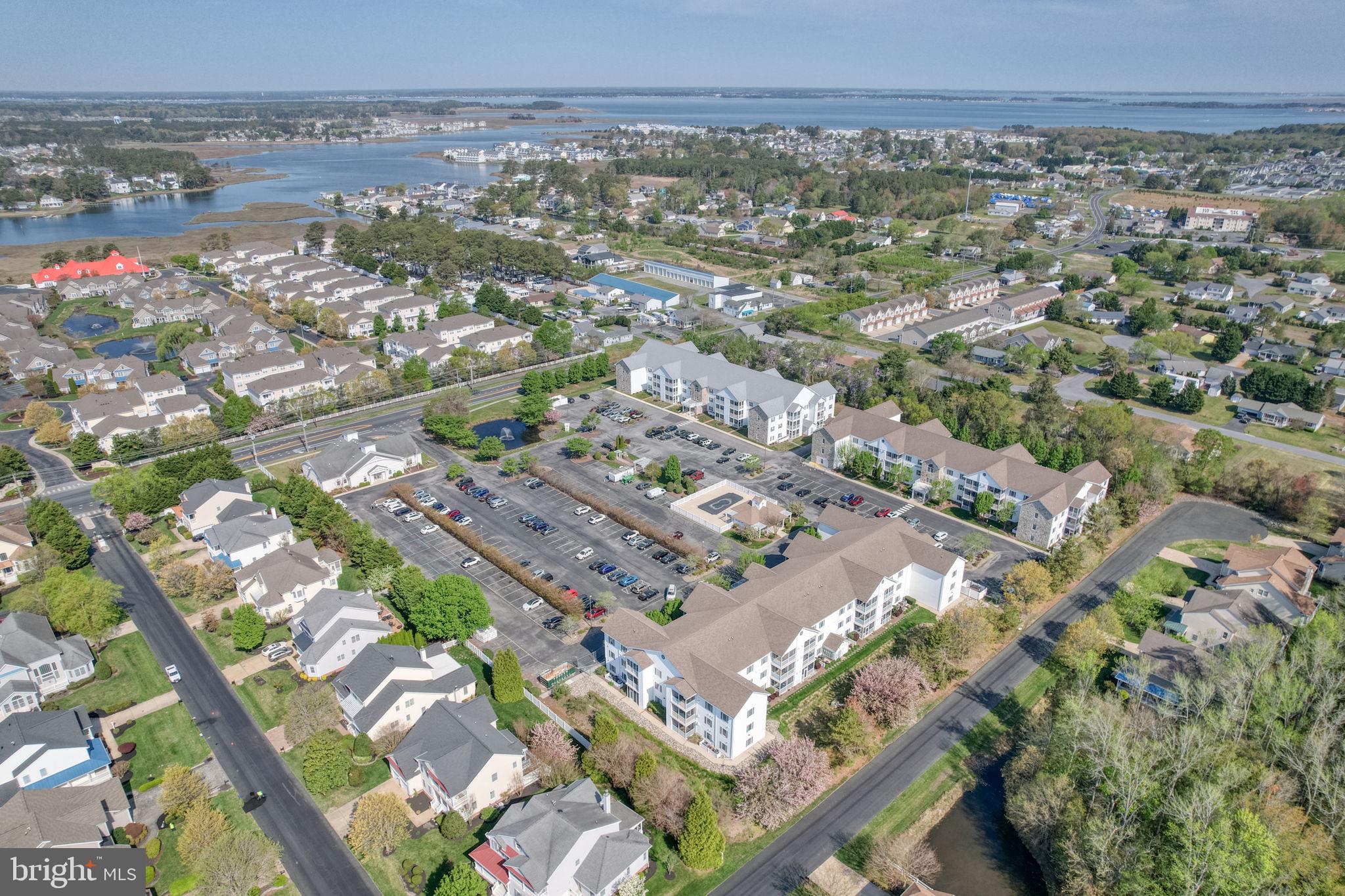 30619 Cedar Neck Road, Unit 1211 Ocean View, DE 19970 - Photo 4 of 64 Aerial view with the bay beyond