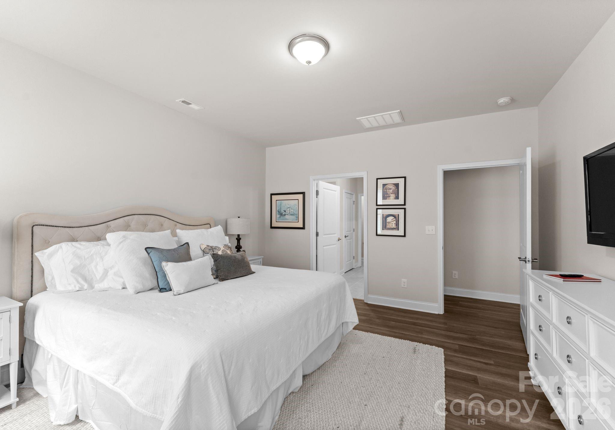 2004 Bonds Lane Fort Mill, SC 29715 - Photo 17 of 41 a bedroom with a bed and a flat screen tv