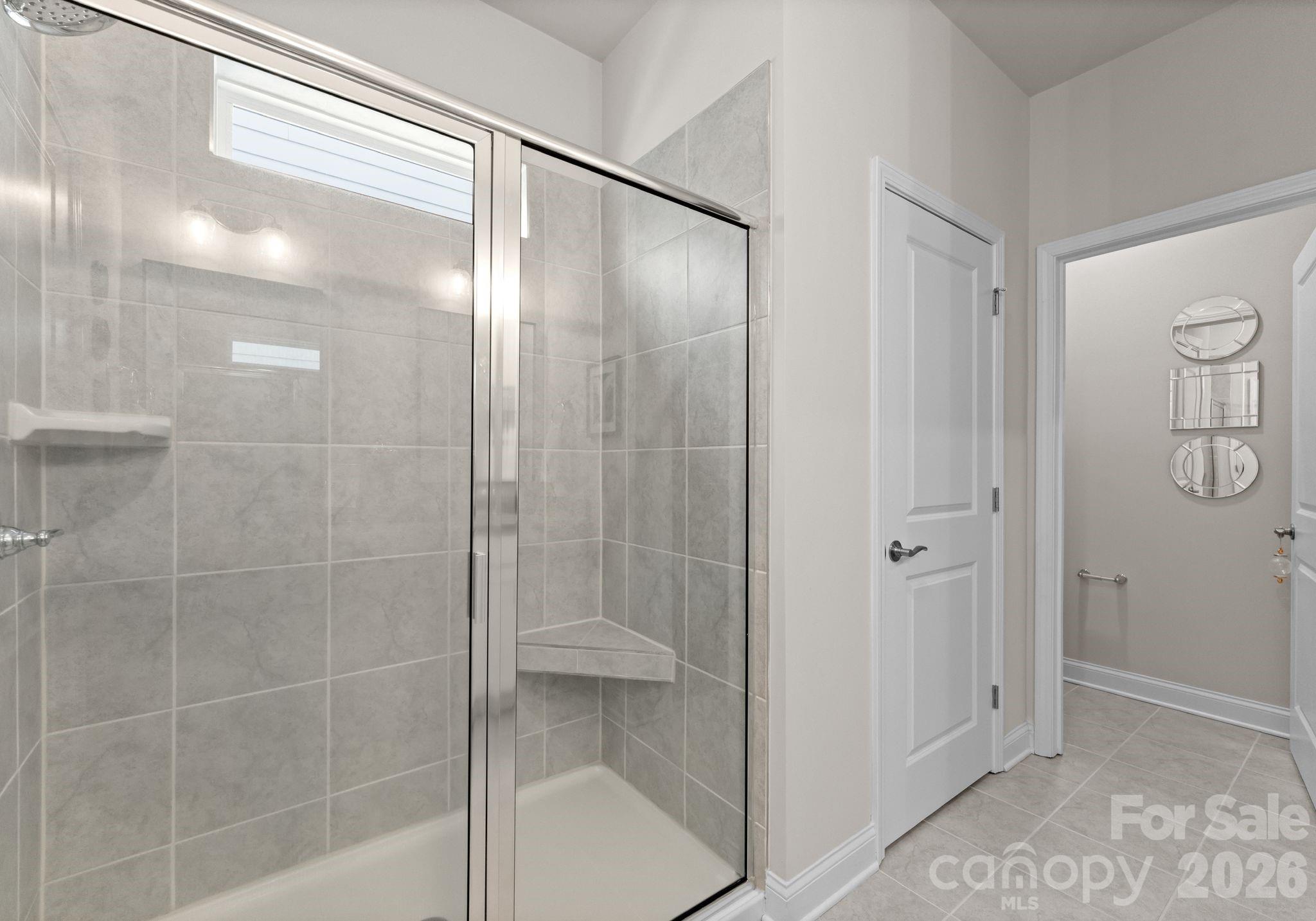 2004 Bonds Lane Fort Mill, SC 29715 - Photo 19 of 41 a bathroom with a glass shower door