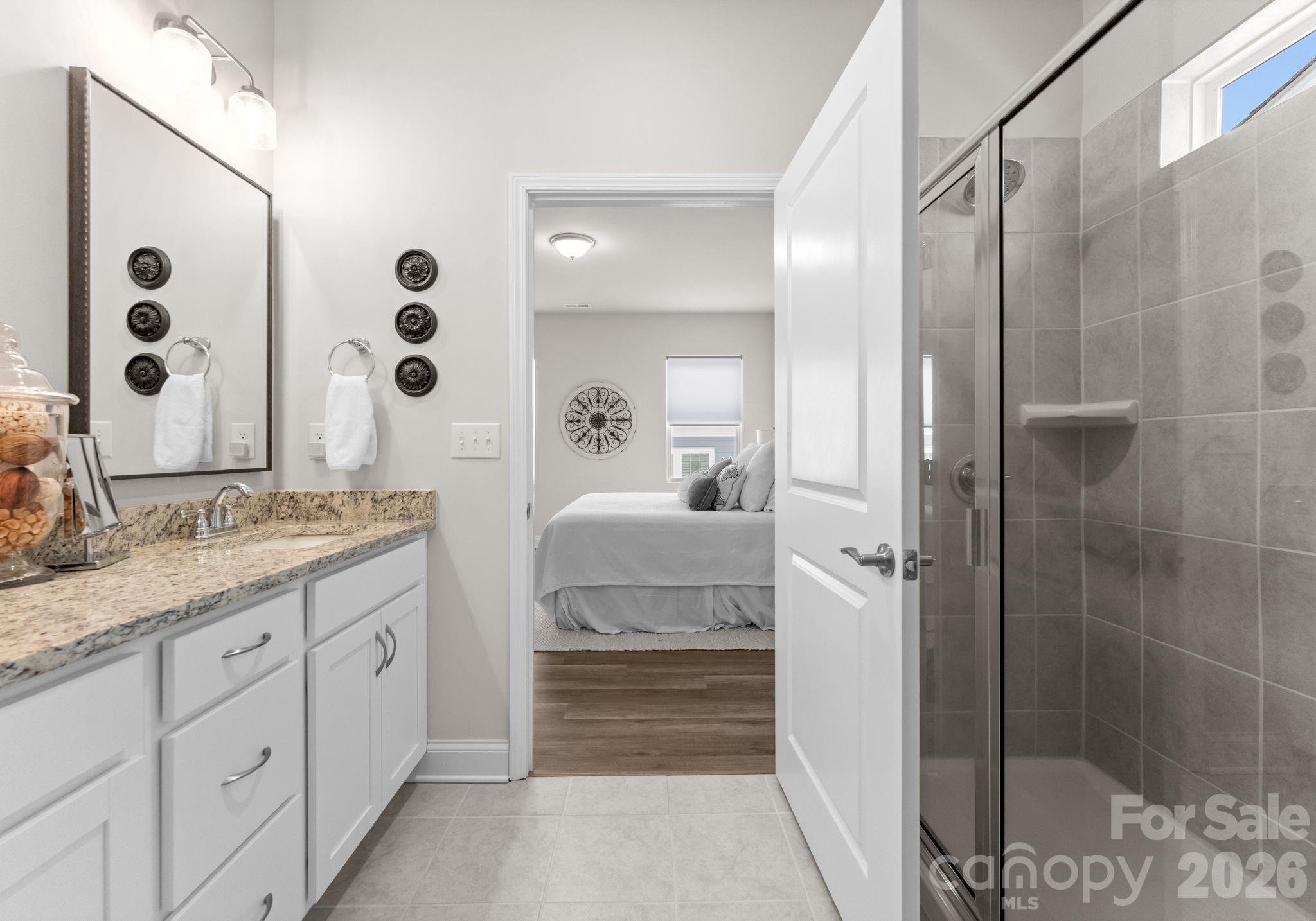 2004 Bonds Lane Fort Mill, SC 29715 - Photo 20 of 41 a bathroom with a double vanity sink and mirror