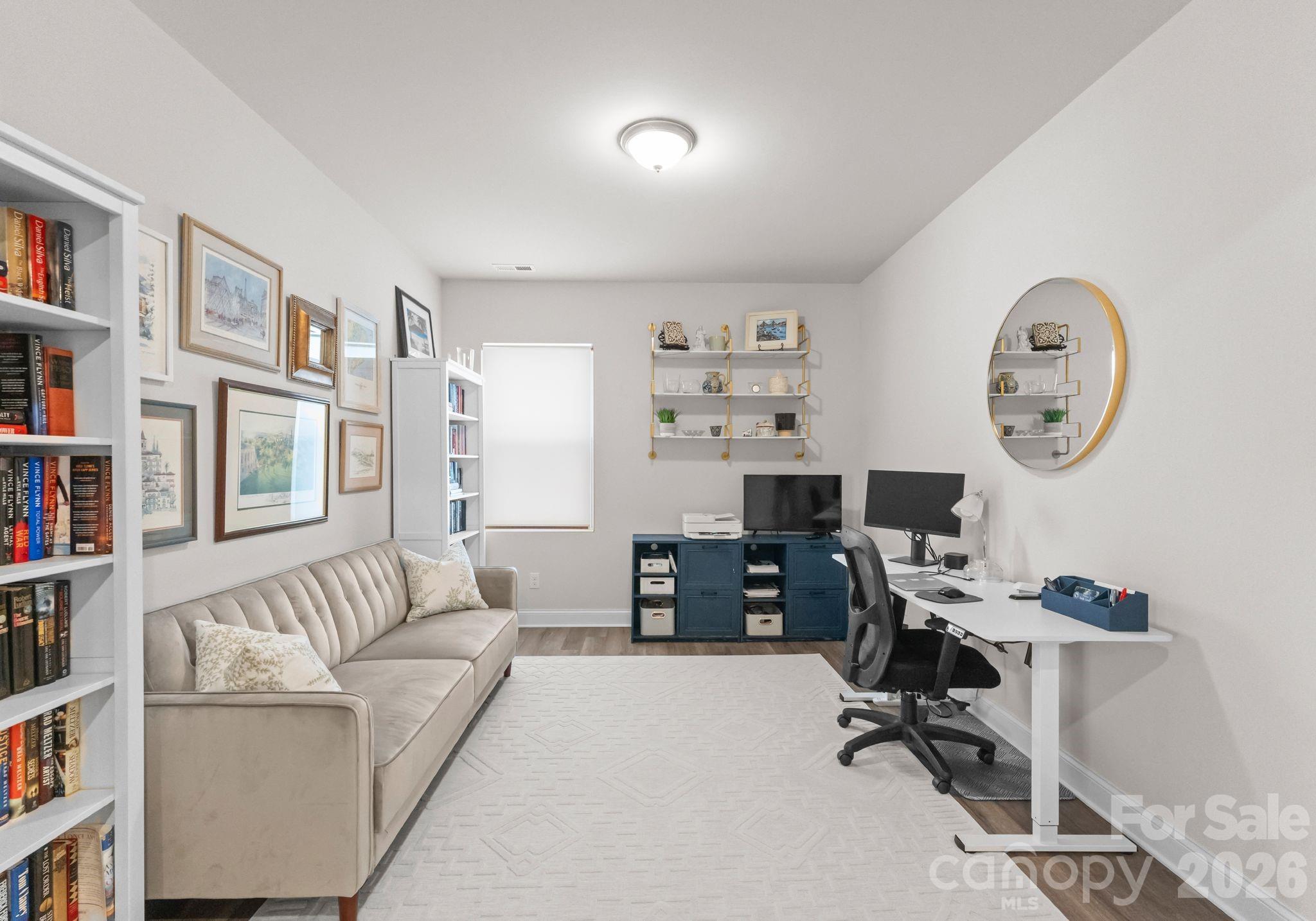 2004 Bonds Lane Fort Mill, SC 29715 - Photo 23 of 41 a view of a livingroom with workspace and a couch
