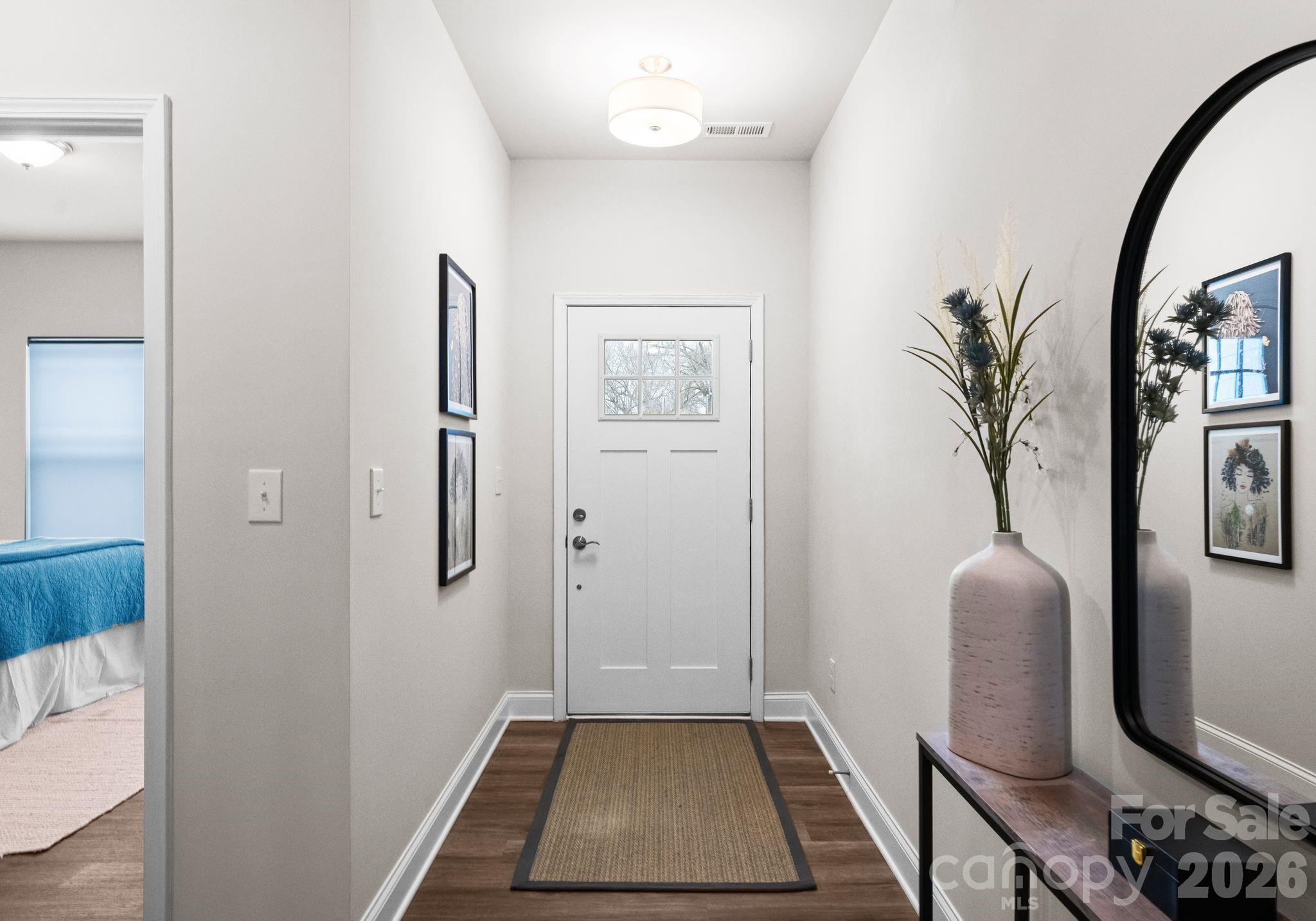 2004 Bonds Lane Fort Mill, SC 29715 - Photo 29 of 41 a hallway with painting and a potted plant