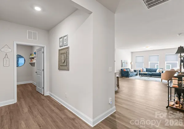 a view of a living room and dining room