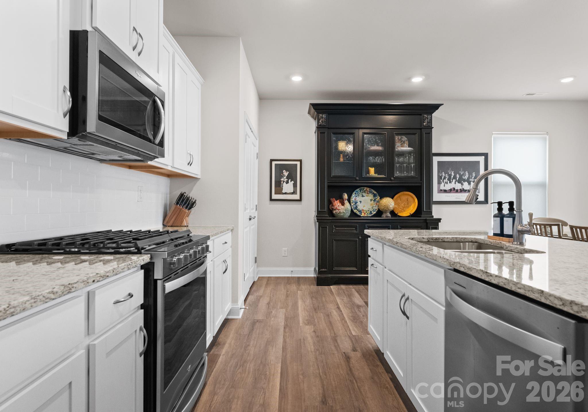 2004 Bonds Lane Fort Mill, SC 29715 - Photo 3 of 41 a kitchen with a stove and a sink