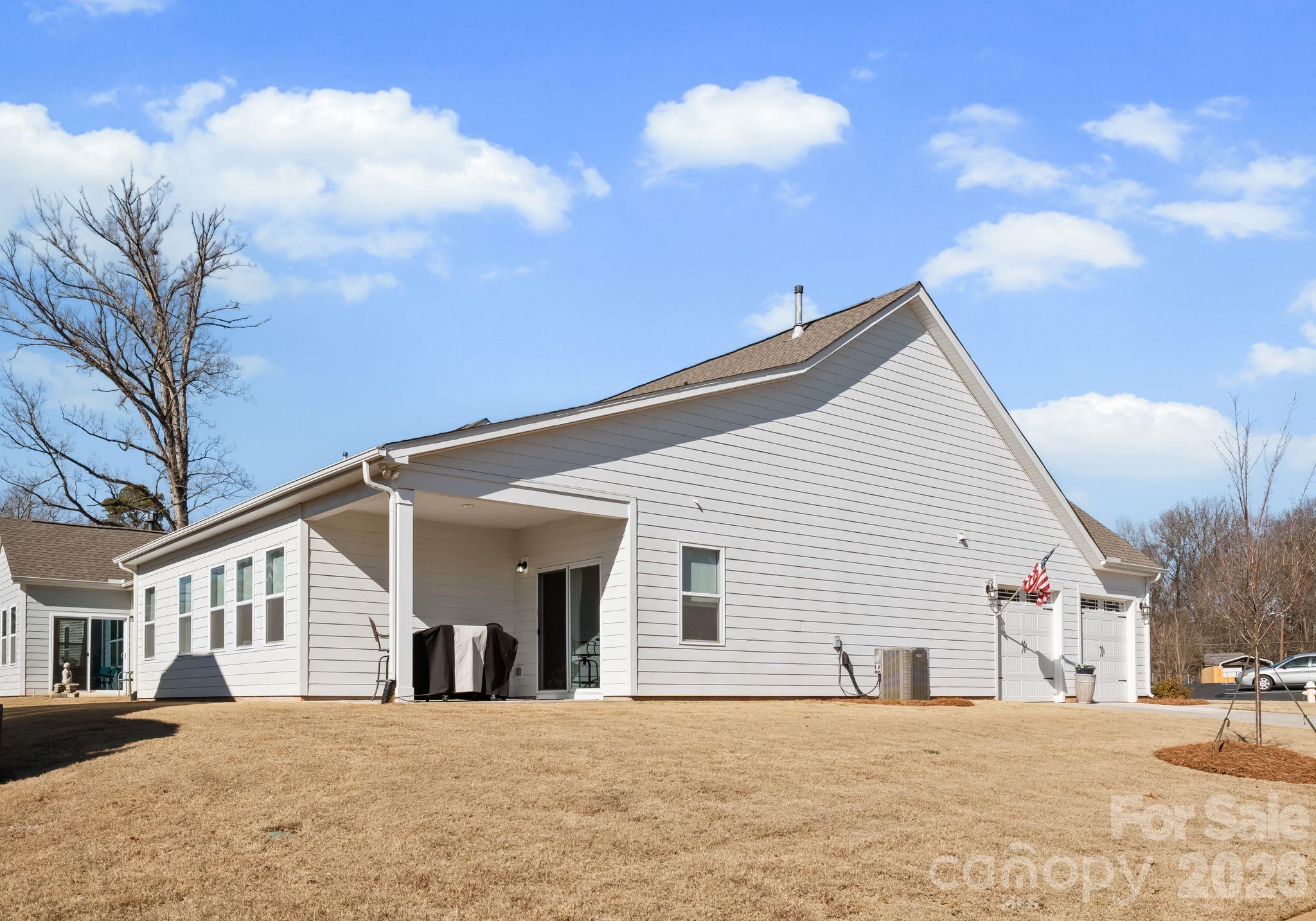 2004 Bonds Lane Fort Mill, SC 29715 - Photo 34 of 41 a view of a house with a patio