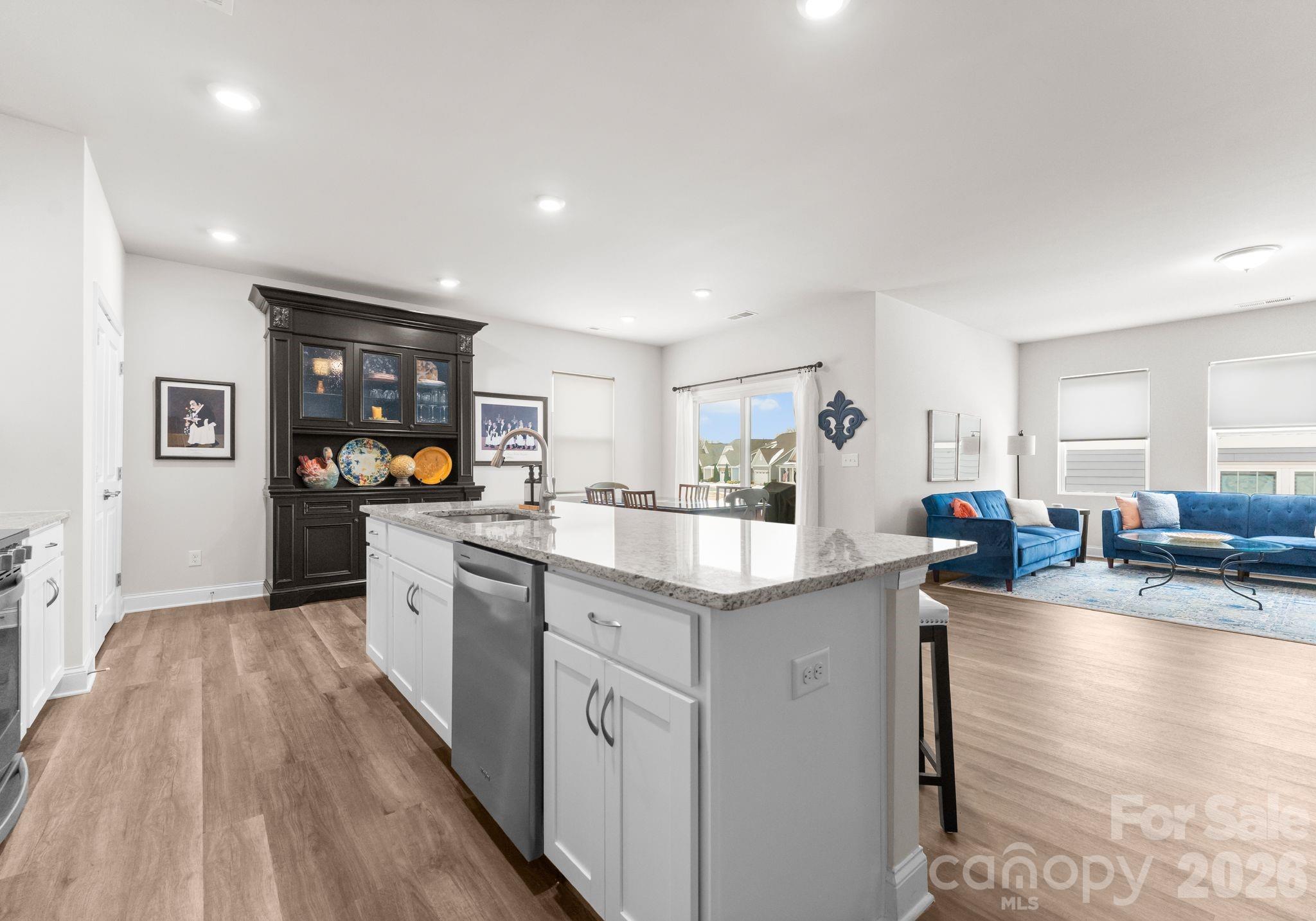 2004 Bonds Lane Fort Mill, SC 29715 - Photo 4 of 41 a kitchen with counter space sink stove and wooden floor