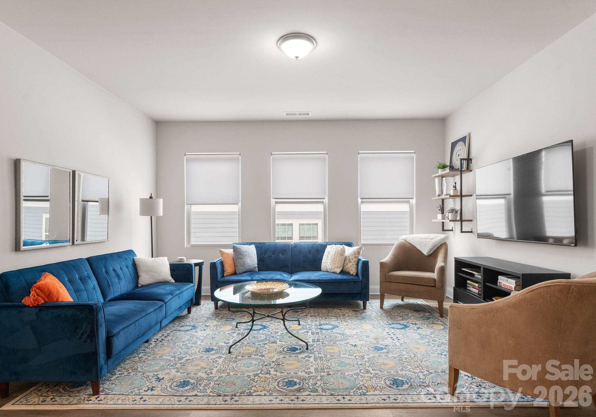 2004 Bonds Lane Fort Mill, SC 29715 - Photo 9 of 41 a living room with furniture a rug and a window