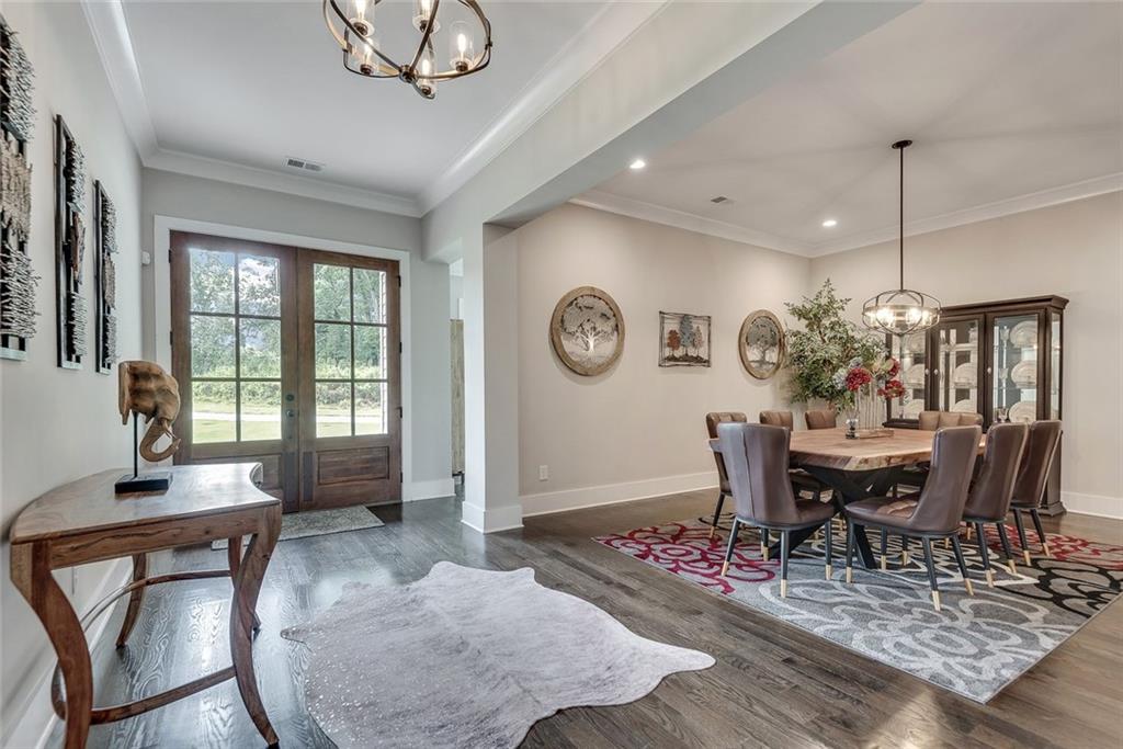 2503 Sugar Pike Road Canton, GA 30115 - Photo 69 of 134 a view of a dining room with furniture window and wooden floor