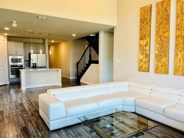 a living room with furniture and a table