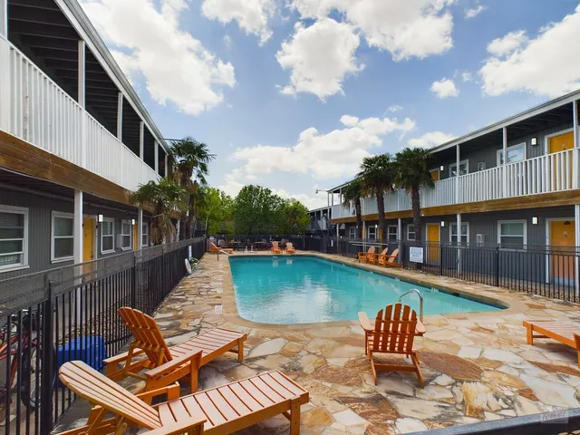 a view of a chairs and table on the terrace
