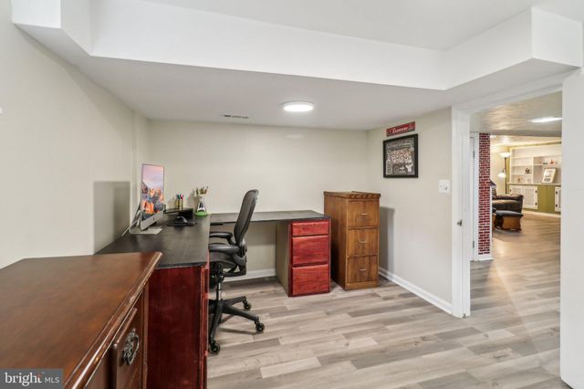 a white bath tub sitting in a bathroom