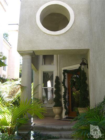 11176 Terraceridge Road Moorpark, CA 93021 - Photo 2 of 13 a front view of a house with garden
