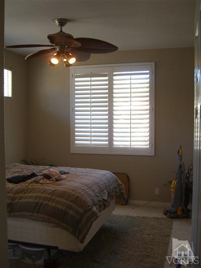 11176 Terraceridge Road Moorpark, CA 93021 - Photo 10 of 13 a bedroom with a bed and a window