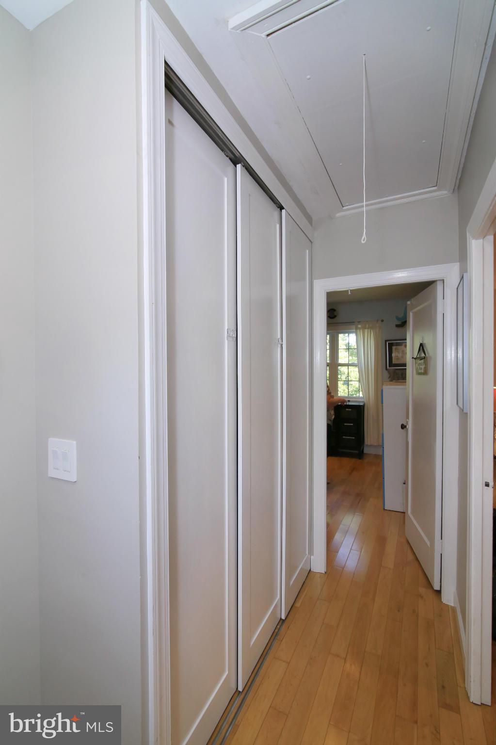 3603 Gunston Road, Unit 3603 Alexandria, VA 22302 - Photo 22 of 27 a view of a hallway with wooden floor