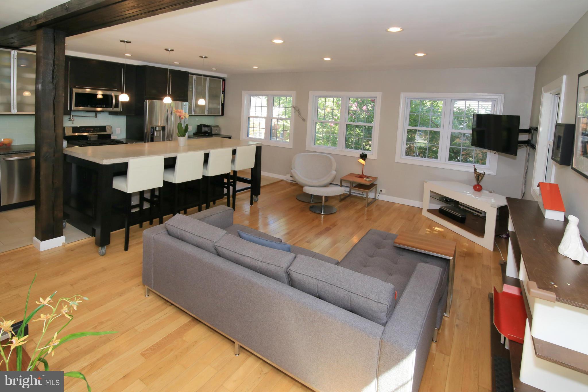 3603 Gunston Road, Unit 3603 Alexandria, VA 22302 - Photo 10 of 27 a living room with furniture kitchen view and a large window