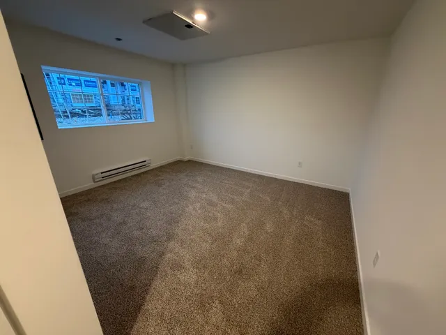 an empty room with windows