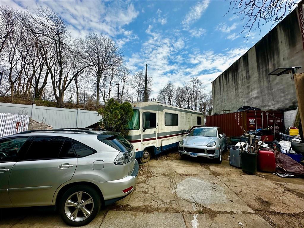 88 Granite Street Brooklyn, NY 11207 - Photo 2 of 2 a view of a car park in front of house