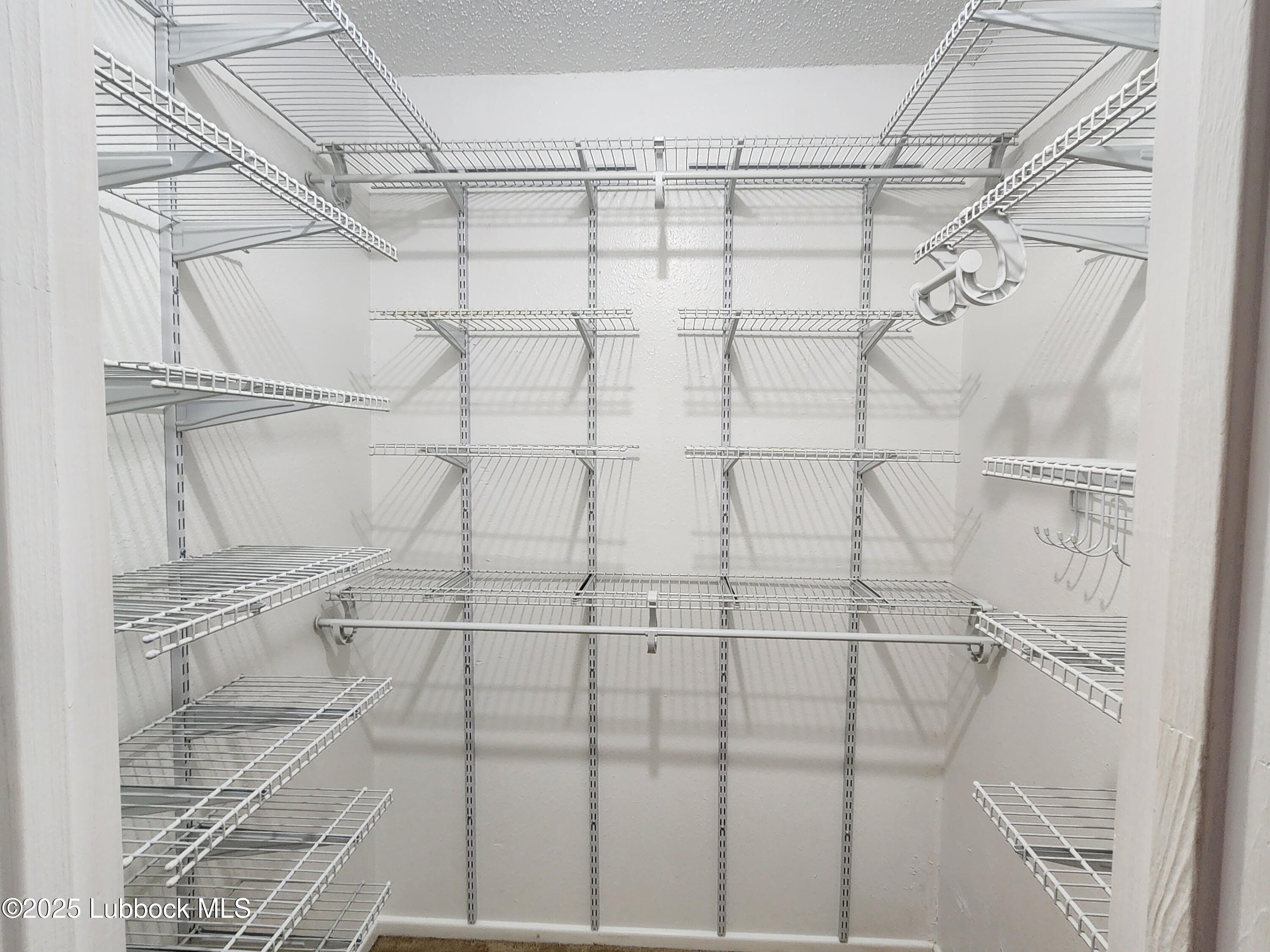 5502 Amherst Street Lubbock, TX 79416 - Photo 19 of 26 a bathroom with a shower