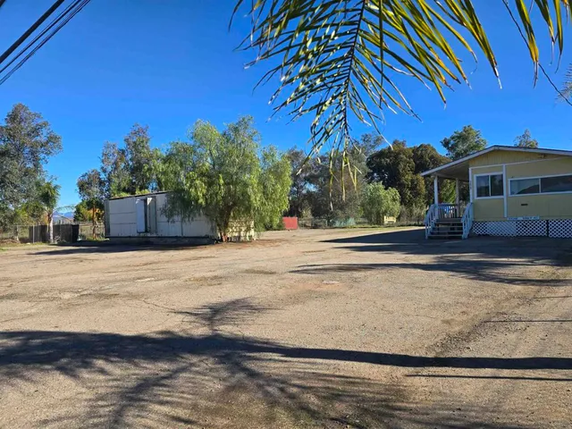 a view of a livingroom with wooden floor