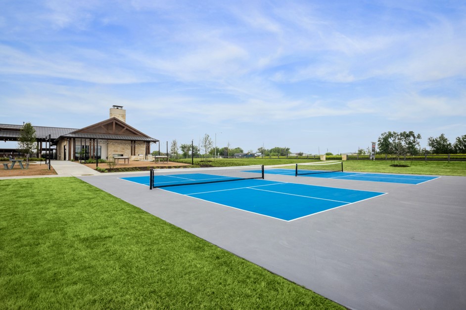 20400 Stelfox Street Manor, TX 78653 - Photo 31 of 37 View of tennis court with a patio