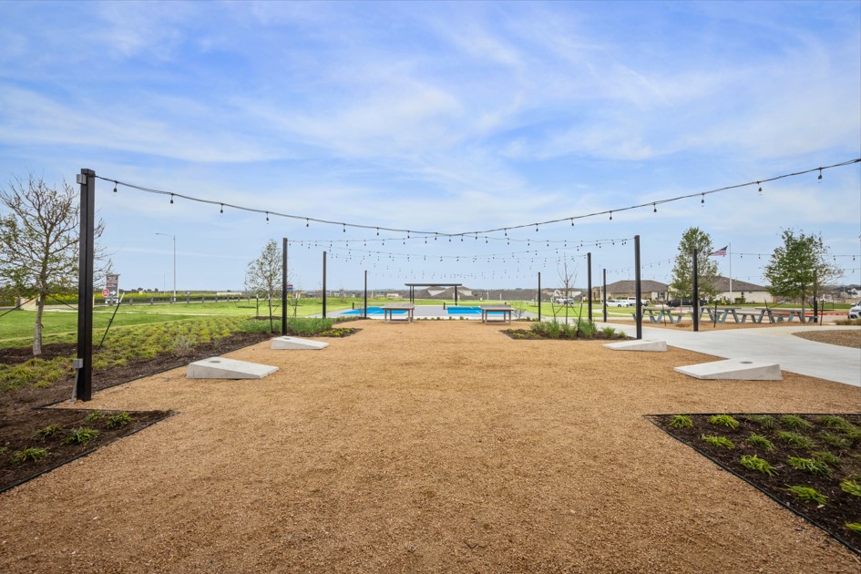 20400 Stelfox Street Manor, TX 78653 - Photo 32 of 37 View of playground with an outdoor pool