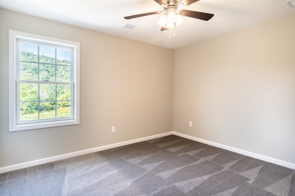 12 Upper Palmer Road Monson, MA 01057 - Photo 20 of 39 an empty room with a window