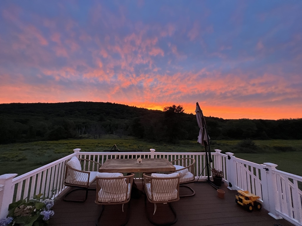 12 Upper Palmer Road Monson, MA 01057 - Photo 2 of 39 a view of balcony with outdoor seating and city view
